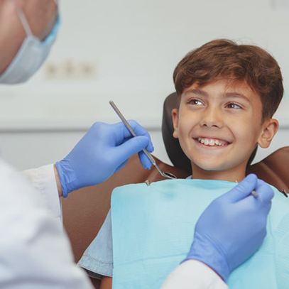 Young boy preparing to undergo pediatric gum disease treatment