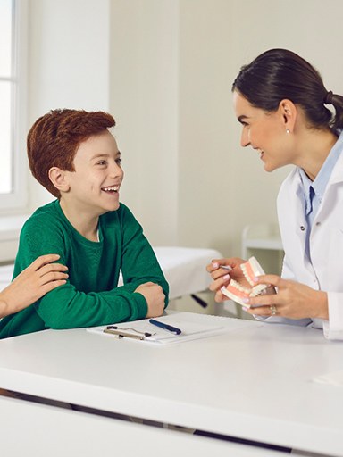 Shocked preteen girl covering her mouth