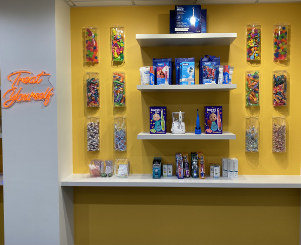 Shelves displaying various oral hygiene products